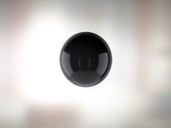 Graphic showing a black sphere in space